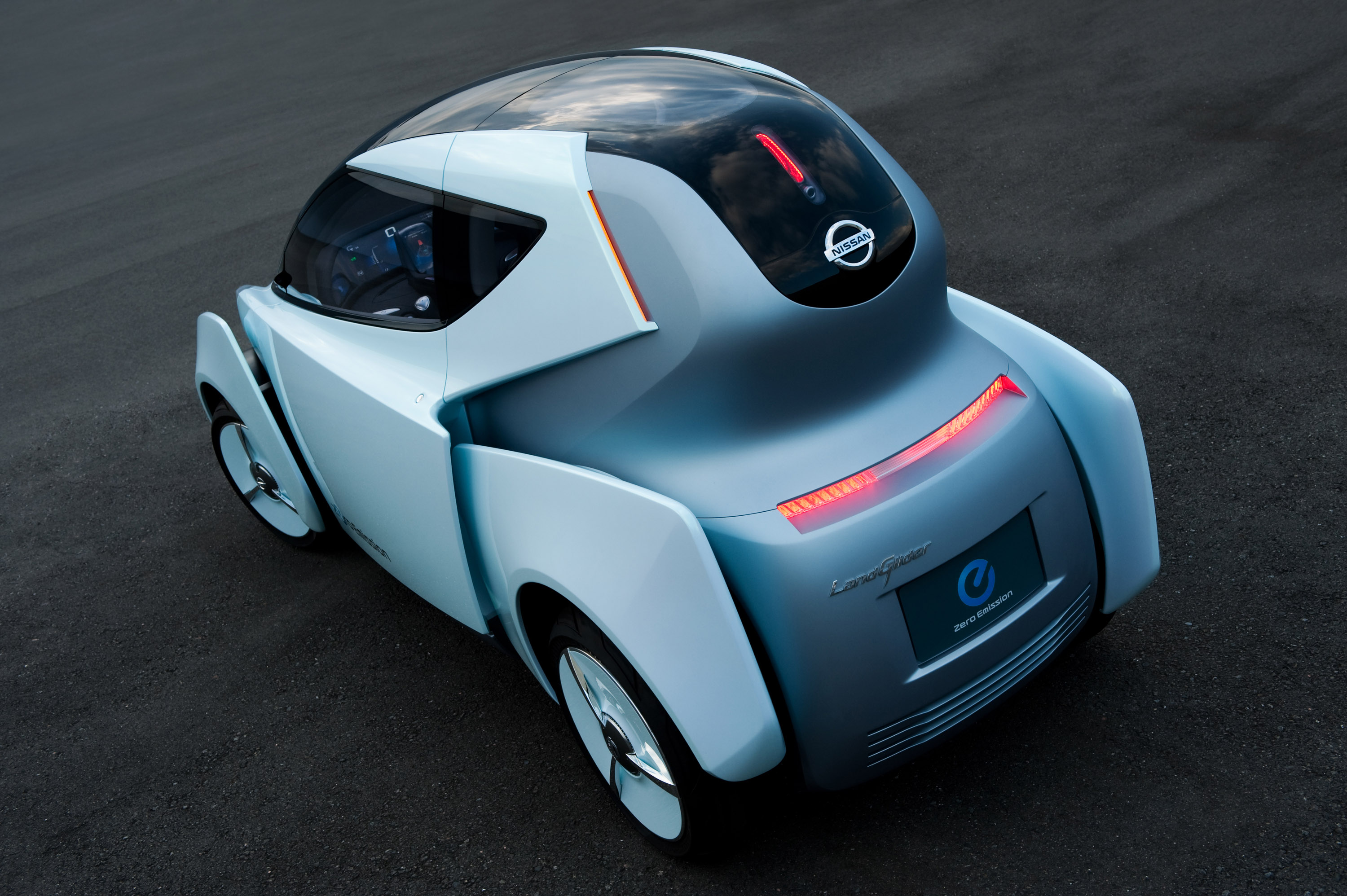 Электр автомобиль. Nissan Land Glider. Nissan Concept 2009. Nissan электромобиль концепт. Nissan электрокар концепт.