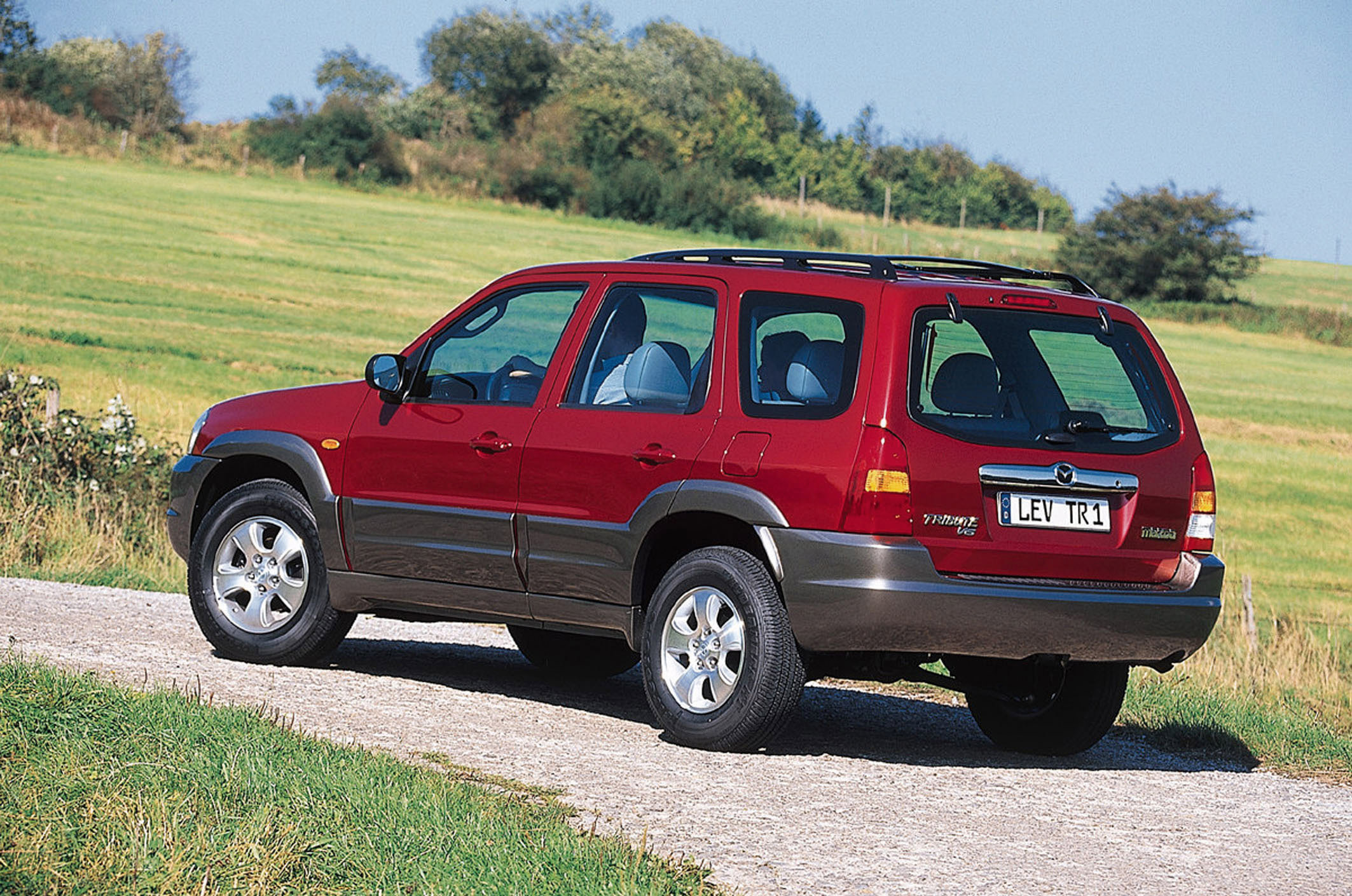 Кроссовер 2000. Мазда трибьют 2000. Мазда трибьют 2000 года. Mazda Tribute 2 поколение. Мазда трибьют 1 поколение.